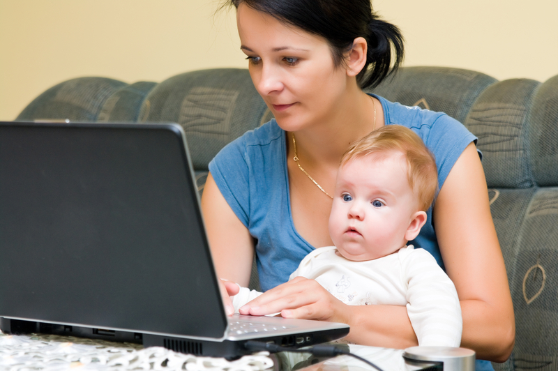 http://www.dreamstime.com/stock-image-mother-baby-laptop-image15789891