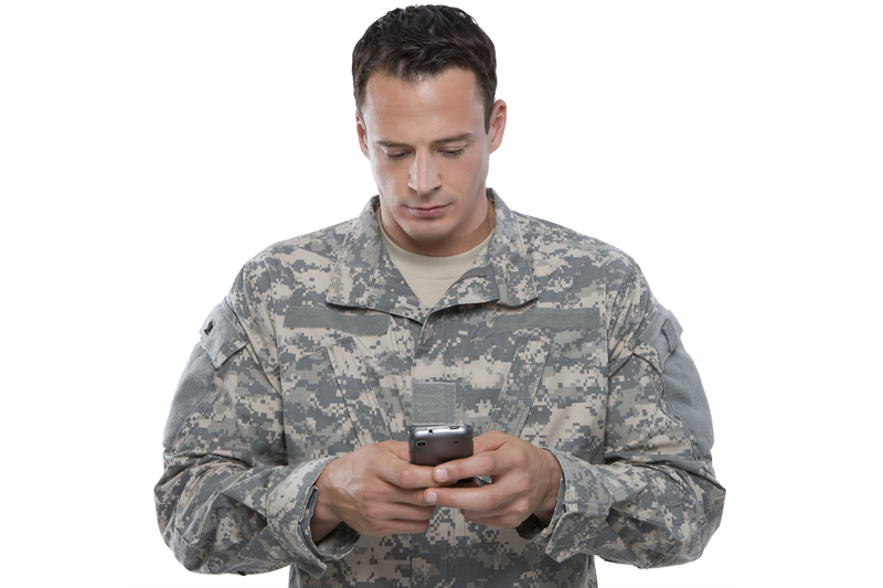 http://www.dreamstime.com/stock-image-serviceman-texting-image25147031