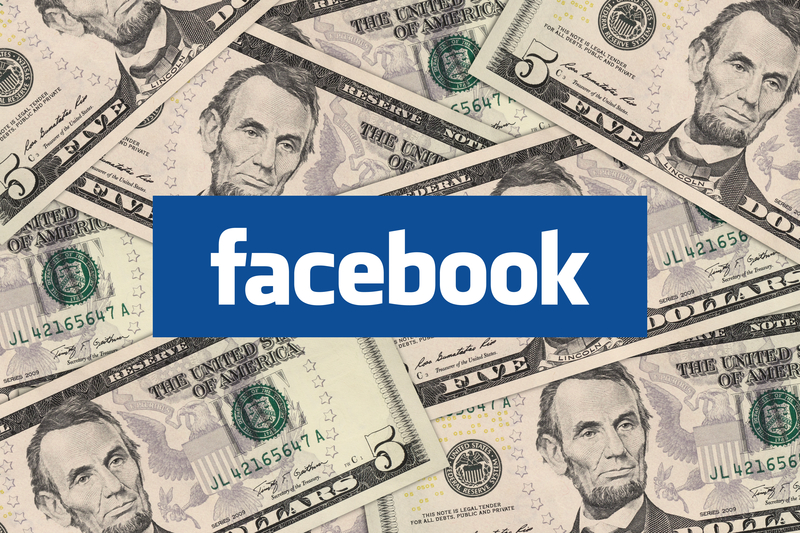 Johor, Malaysia - Jan 1, 2014: Photo of Facebook icon and cash money. Marketers are starting to embrace the social network as a place to do business. Jan 1, 2014 in Johor, Malaysia.