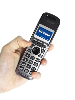 http://www.dreamstime.com/royalty-free-stock-photography-social-networking-cordless-phone-loading-facebook-image24405277